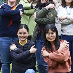 Members of the depatment do the international women's day embrace
