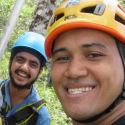 Sarab Sethi and colleague in a tree
